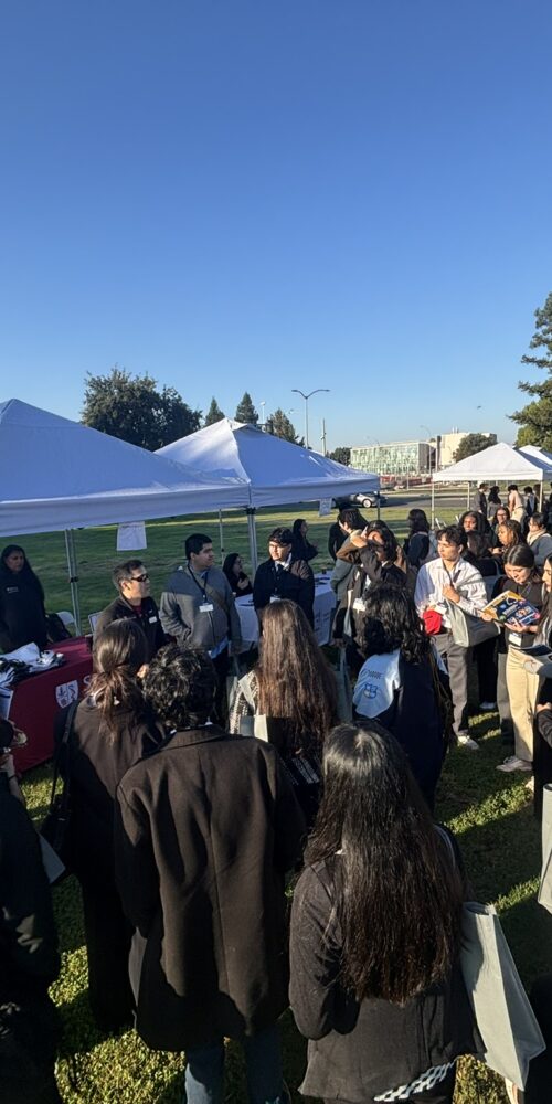 Pre-Health Fair events talking with a rep